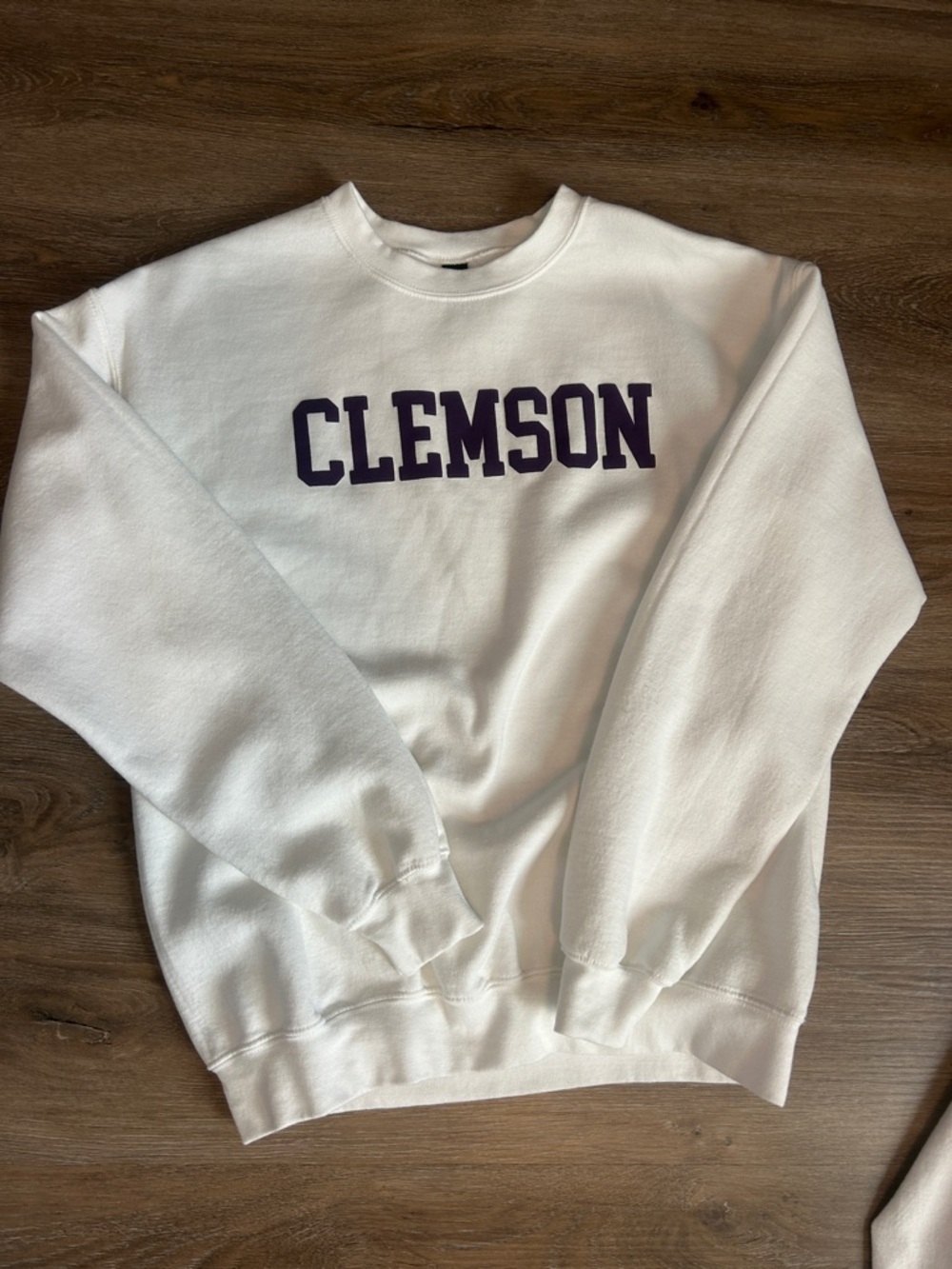 Gildan White Crewneck Sweatshirt with Purple "CLEMSON" Chest Lettering
